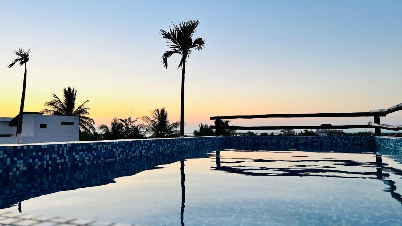 Hotel Mayari Holbox Exterior photo Sunset at the beach