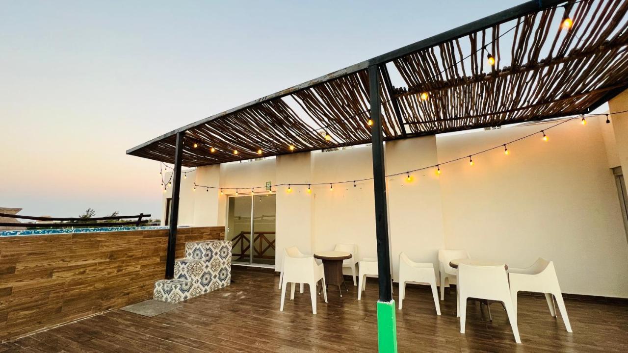 Hotel Mayari Holbox Exterior photo Rooftop bar at the hotel